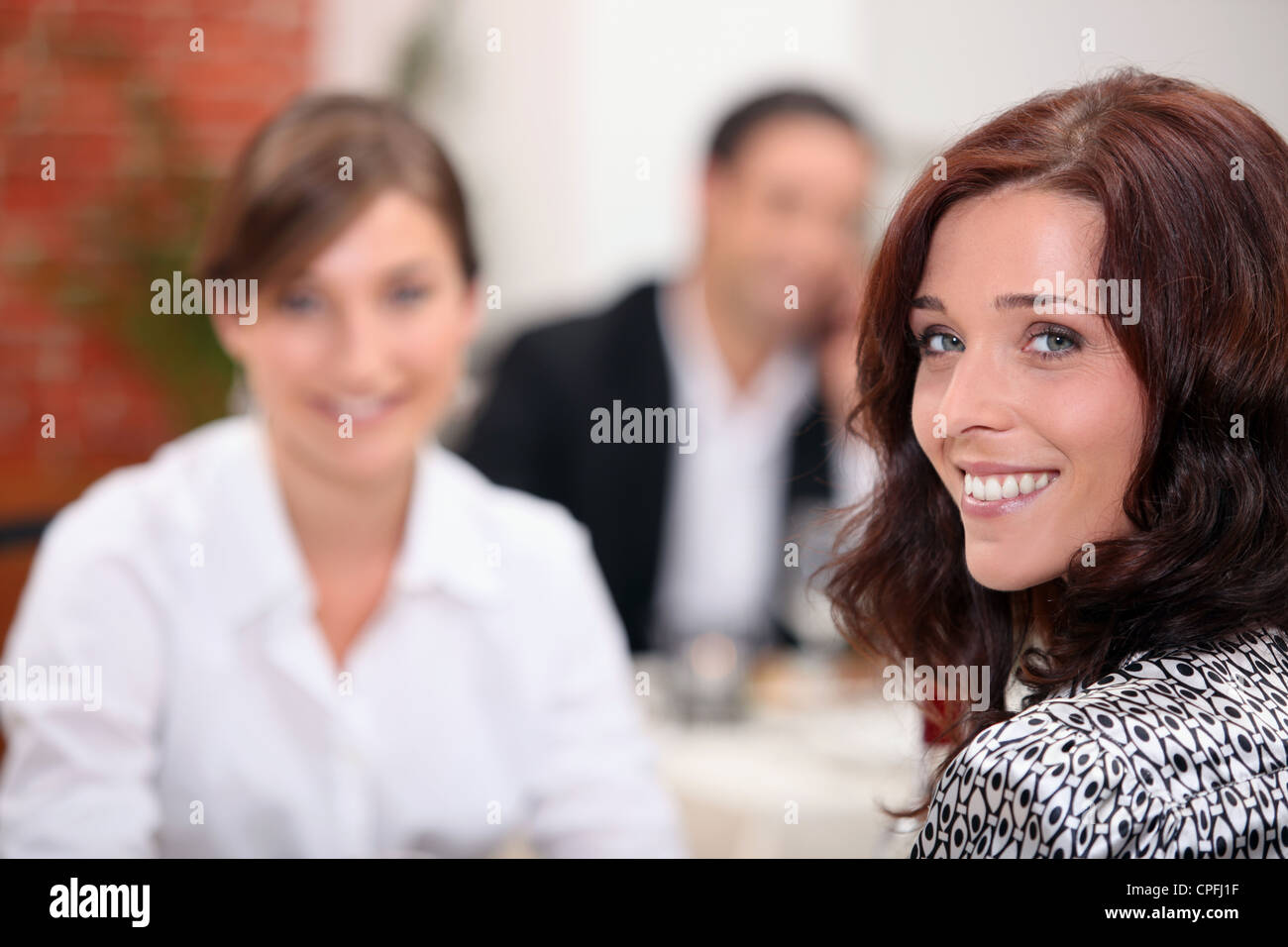 Two female friends at a restaurant. Stock Photo