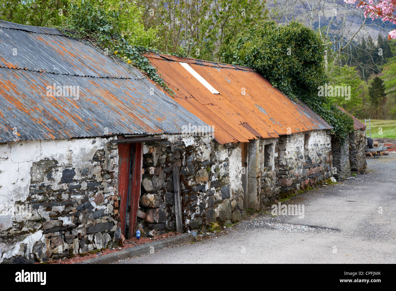 abandoned ruined old corrugated iron scottish cottages in Glencoe highlands scotland uk Stock Photo