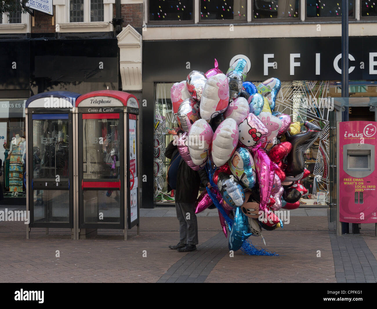 A colourful balloon seller in KingstonuponThames, London England