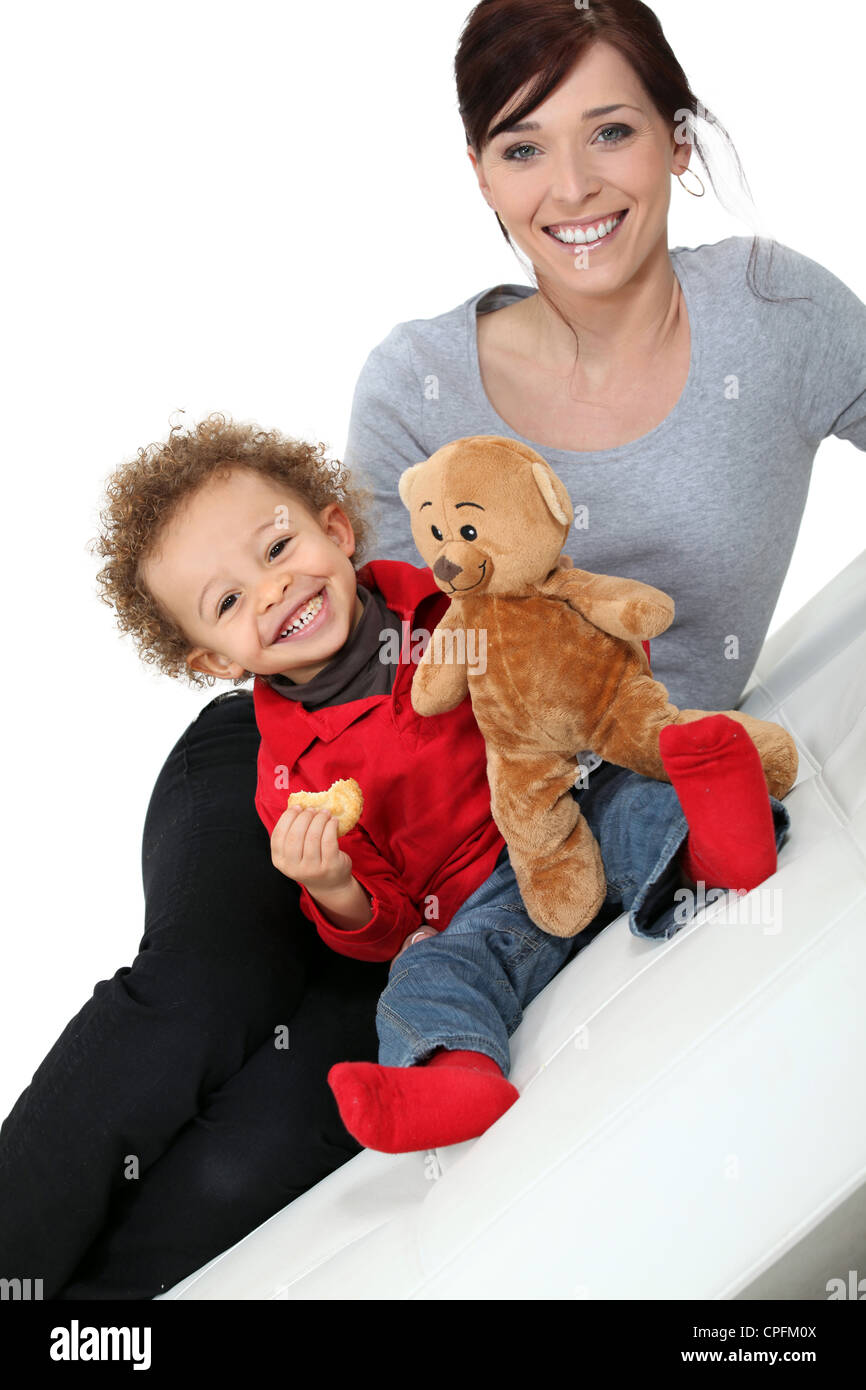 Mom with baby and teddy bear Stock Photo - Alamy