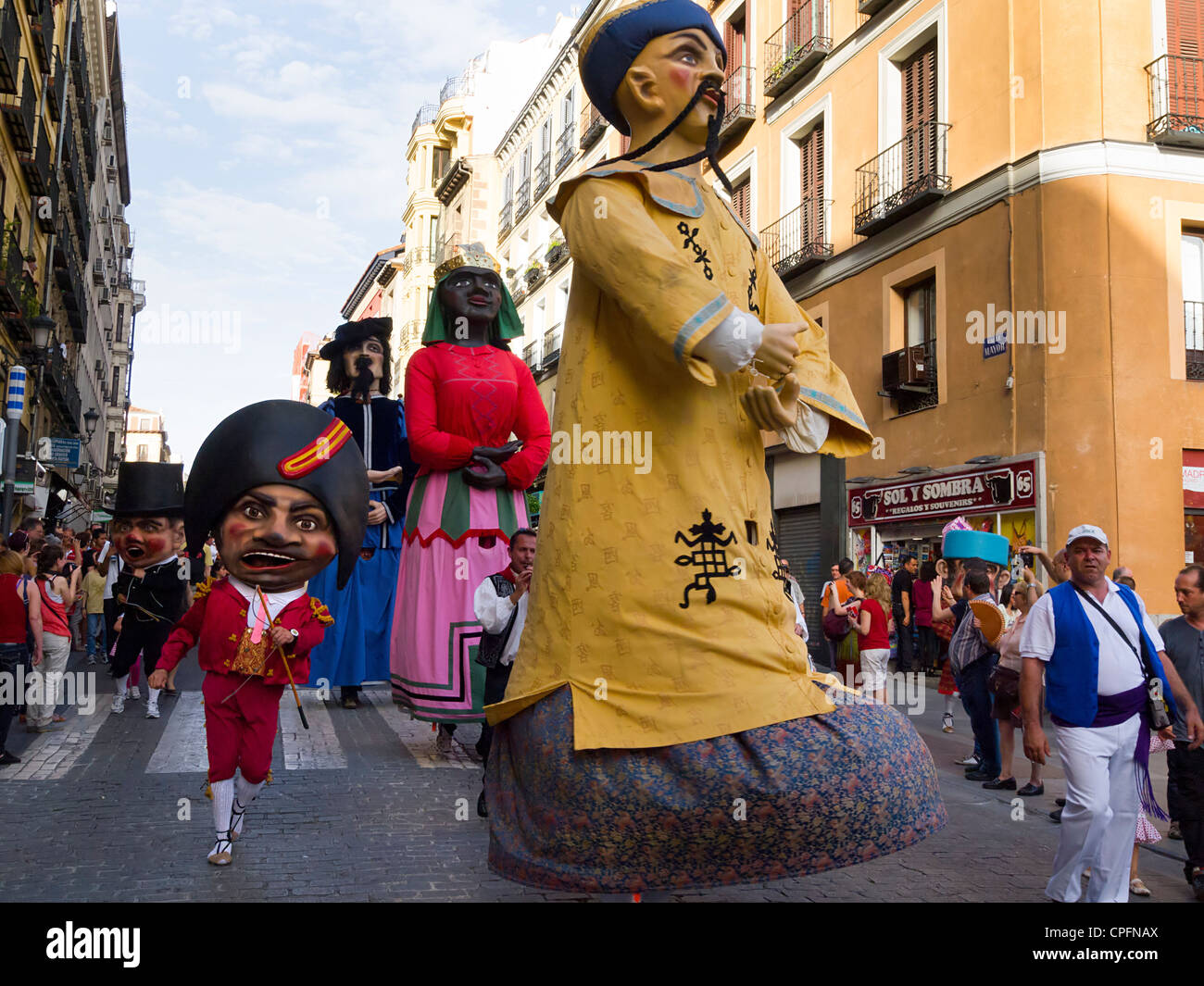Giants and big-heads (gigantes y cabezudos) puppet parade during the San Isidro festivities in Madrid, Spain, 11 May 2012 Stock Photo