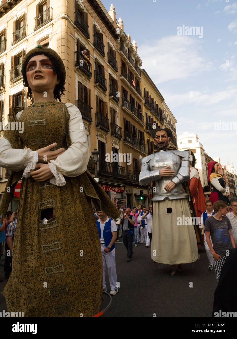 Giants and big-heads (gigantes y cabezudos) puppet parade during the San Isidro festivities in Madrid, Spain, 11 May 2012 Stock Photo