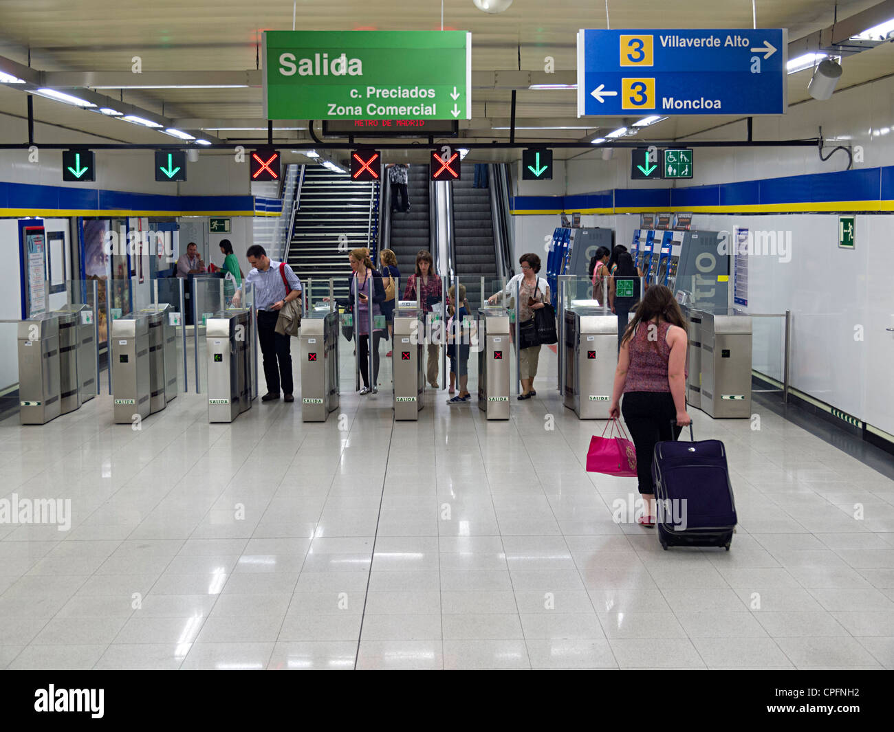 Ticket validation machines at a Madrid metro station Stock Photo Alamy