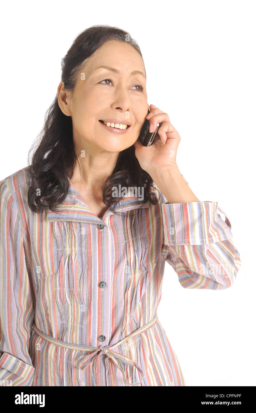 Senior woman talking on mobile phone Stock Photo - Alamy