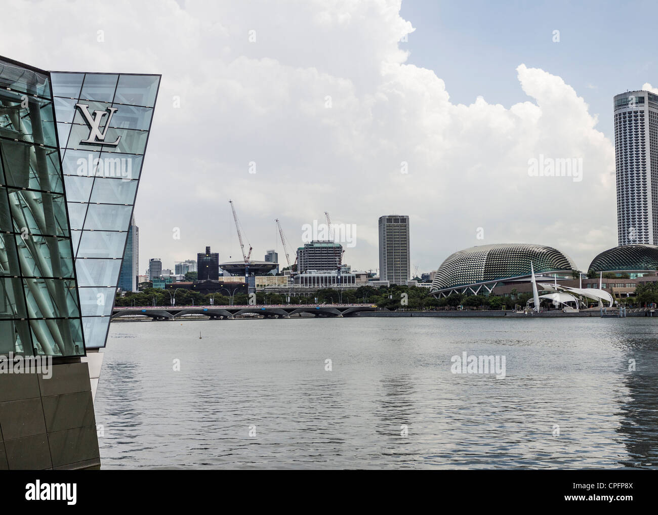 Louis Vuitton shop at Marina Bay Sands, Singapore. A modern shopping, hotel and casino complex. Stock Photo