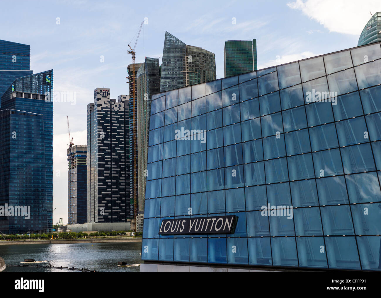 Louis Vuitton shop at Marina Bay Sands, Singapore. A modern shopping, hotel and casino complex. Stock Photo