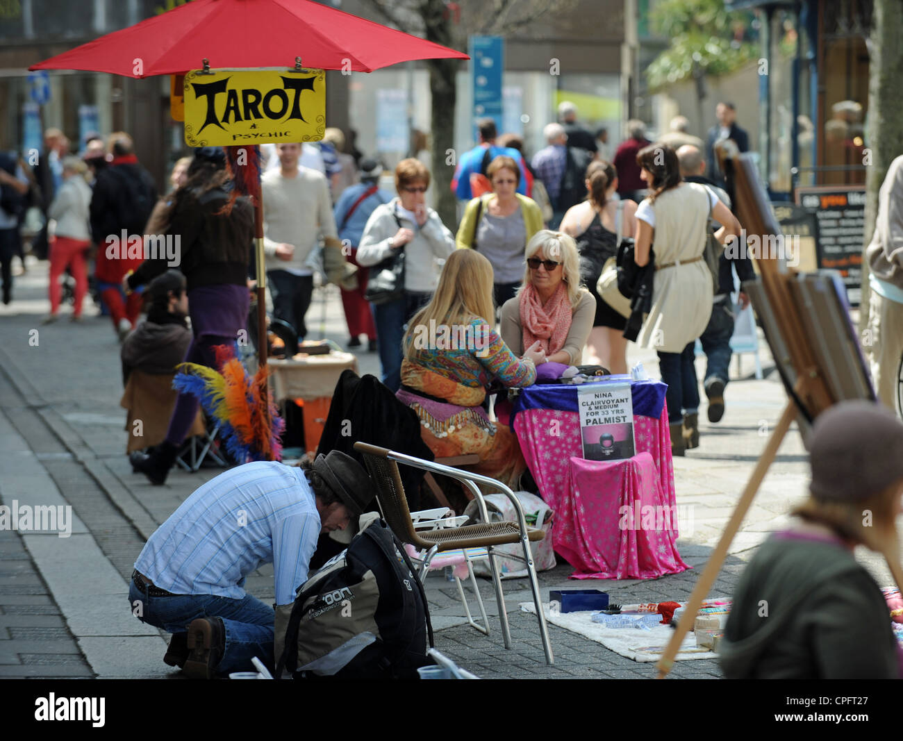 Tarot reading stall in the fashionable East Street shopping area of Brighton Sussex UK Stock Photo