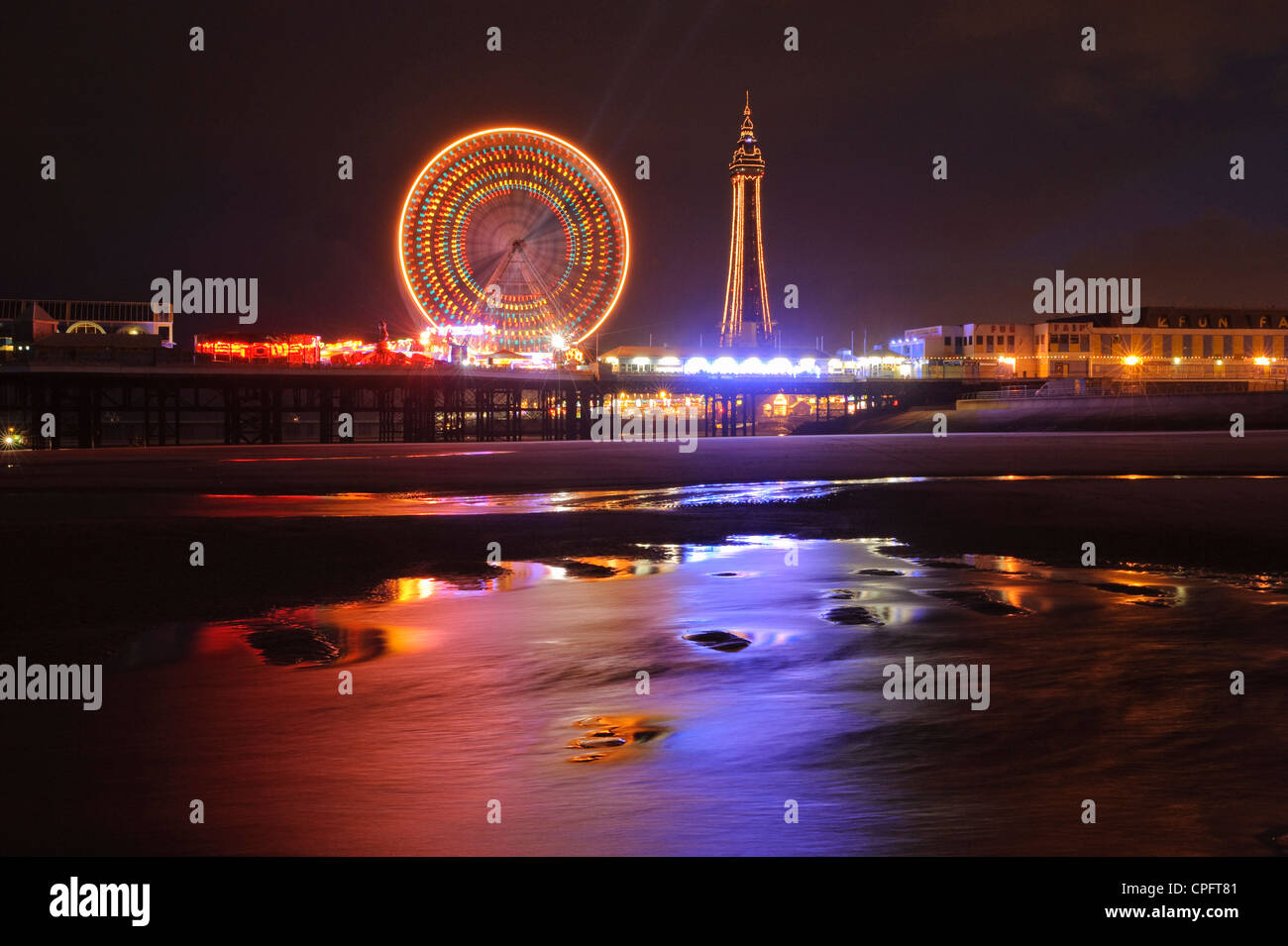 Central Pier and Blackpool Tower during Illuminations Blackpool England Stock Photo