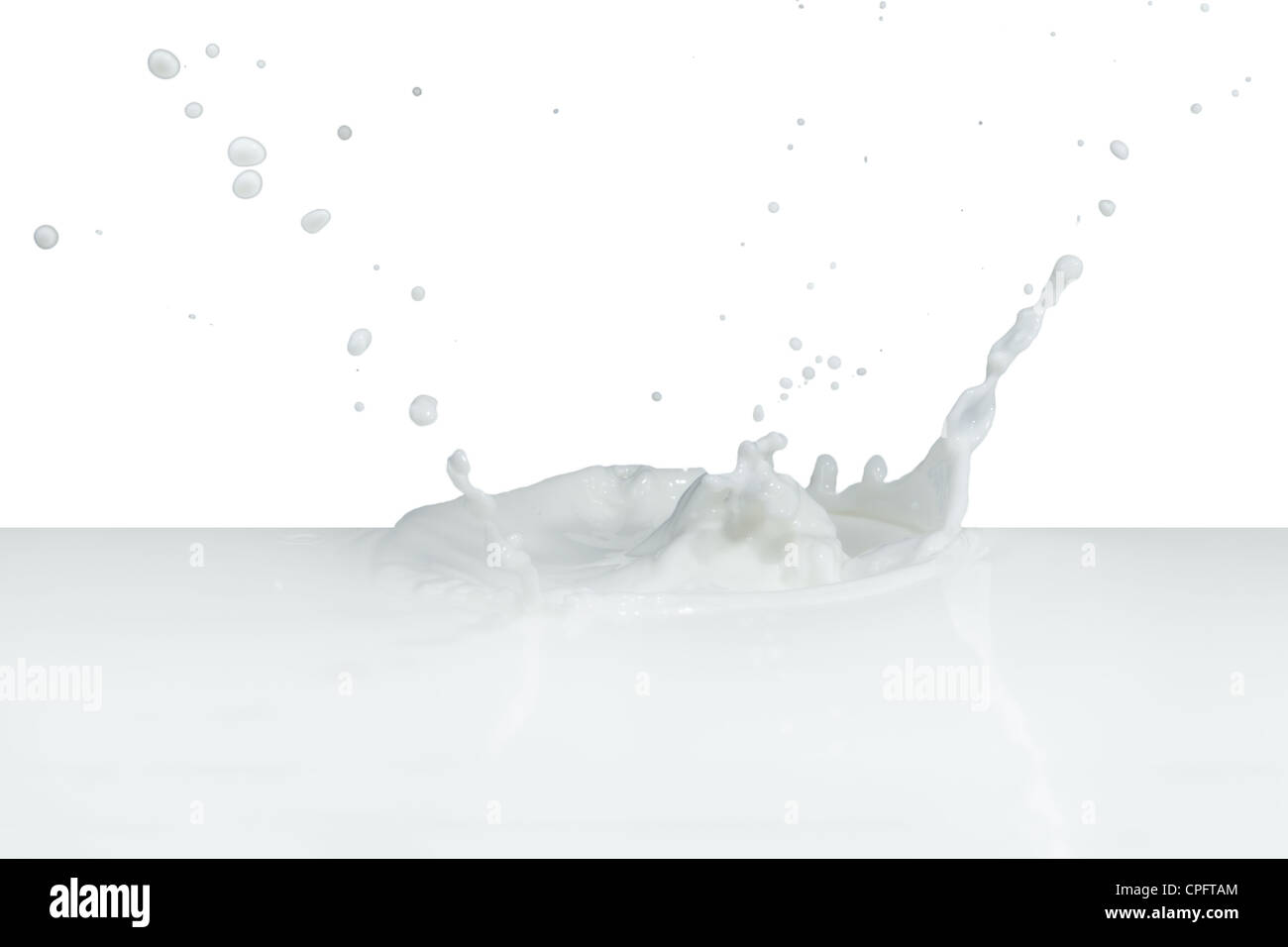 splashing milk isolated on white background Stock Photo - Alamy