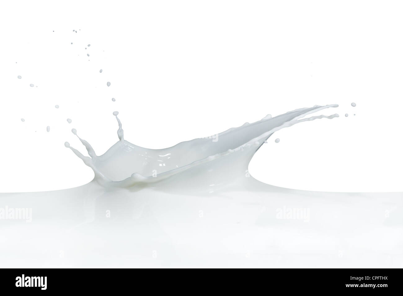 splashing milk isolated on white background Stock Photo - Alamy