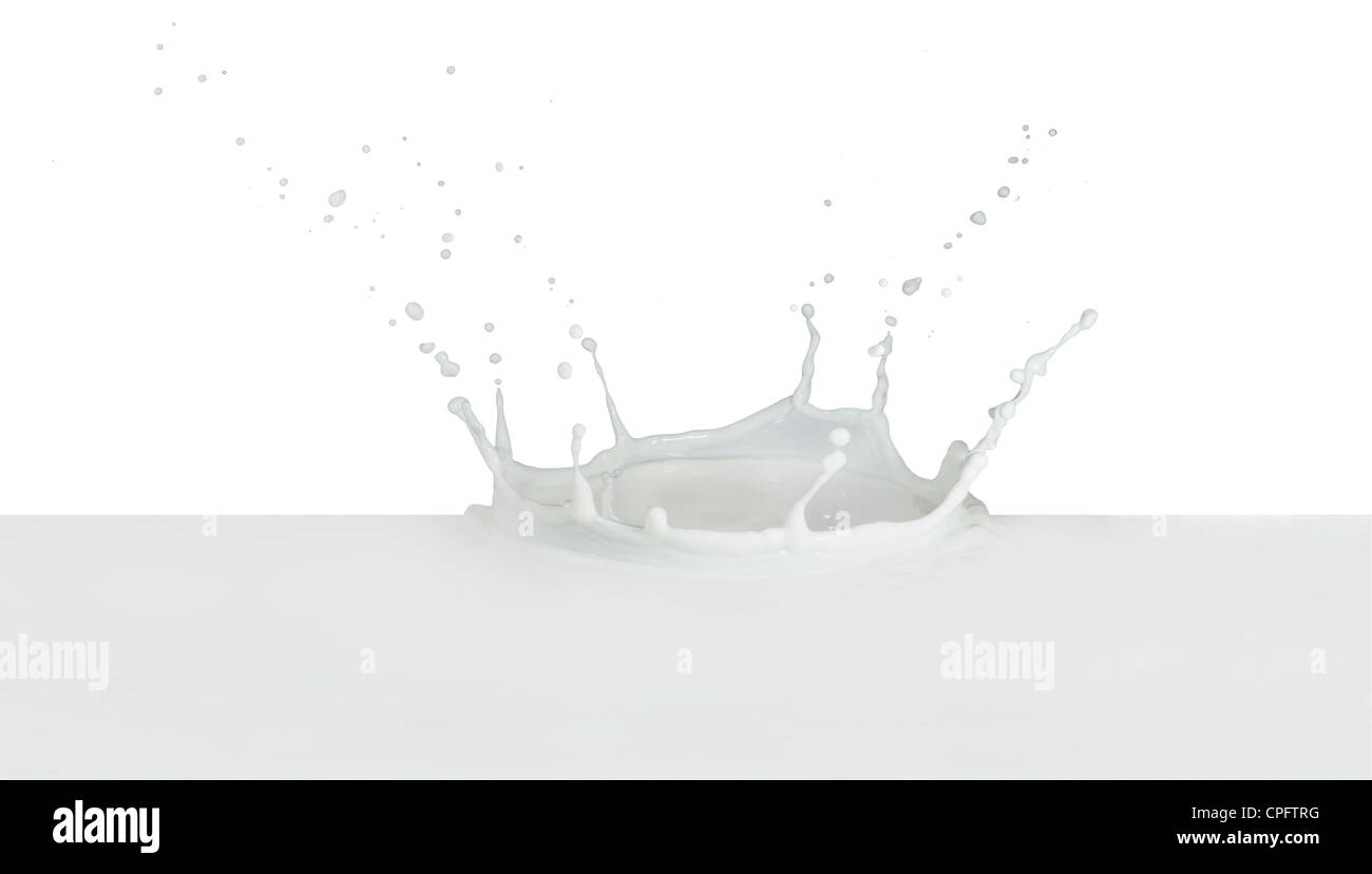 splashing milk isolated on white background Stock Photo - Alamy