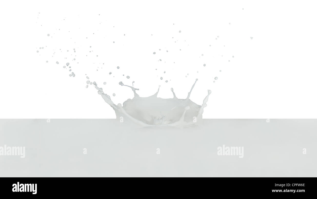 splashing milk isolated on white background Stock Photo - Alamy