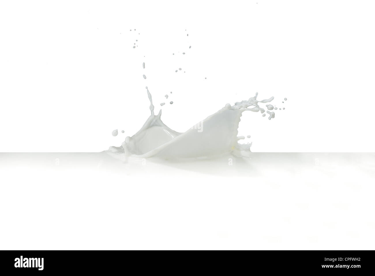 splashing milk isolated on white background Stock Photo - Alamy
