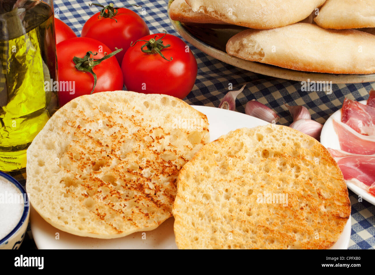 Typical breakfast mollete with ham tomato and oil Antequera Malaga Andalusia Spain Stock Photo
