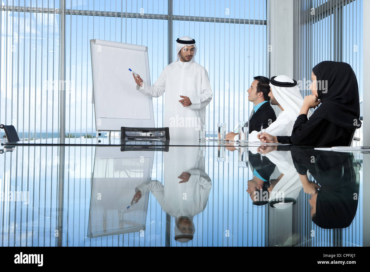 Multiethnic business people in a meeting, arab businessman having a