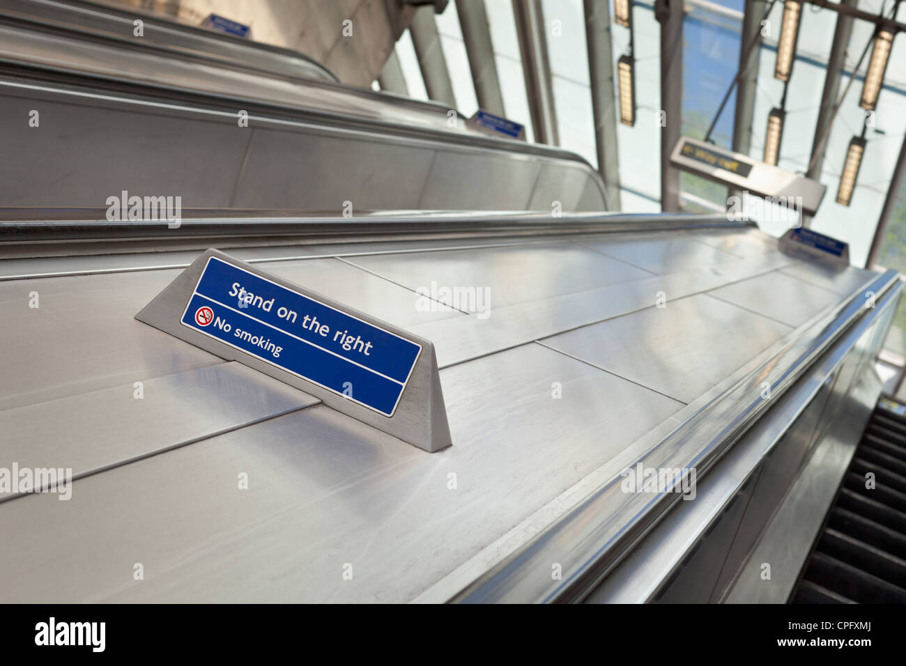 'Stand on the right' and 'no smoking' sign on london underground