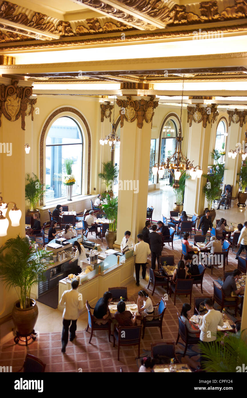 Balcony view of The Peninsula Hotel lobby during busy afternoon high tea time. September 2011. Stock Photo