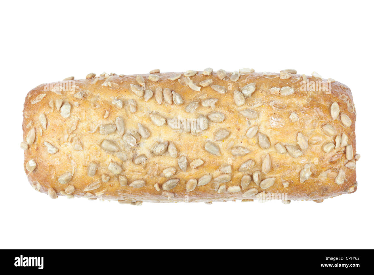 Wholemeal bread roll topped with sunflower seeds Stock Photo