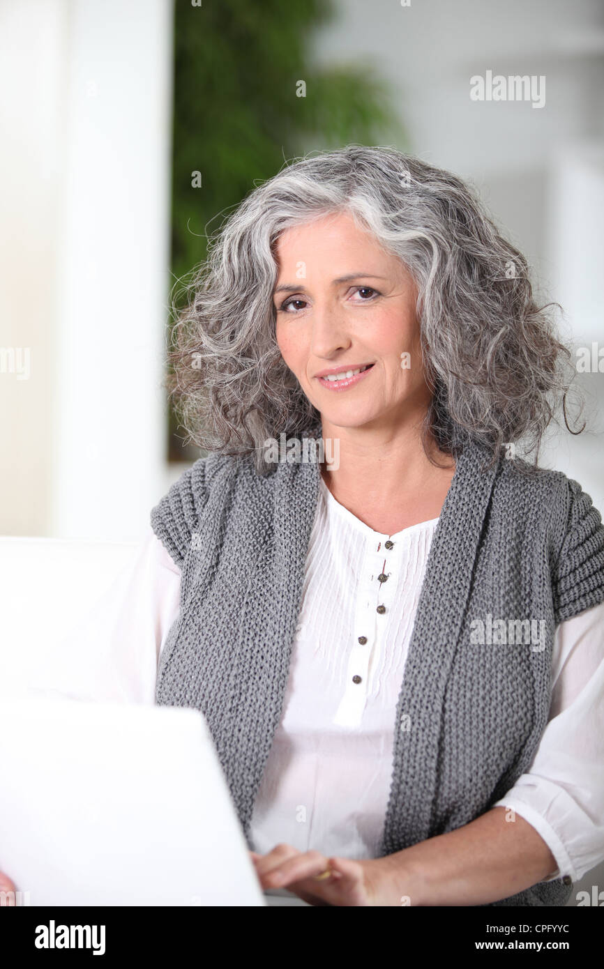 Grey haired lady using hi-res stock photography and images - Alamy