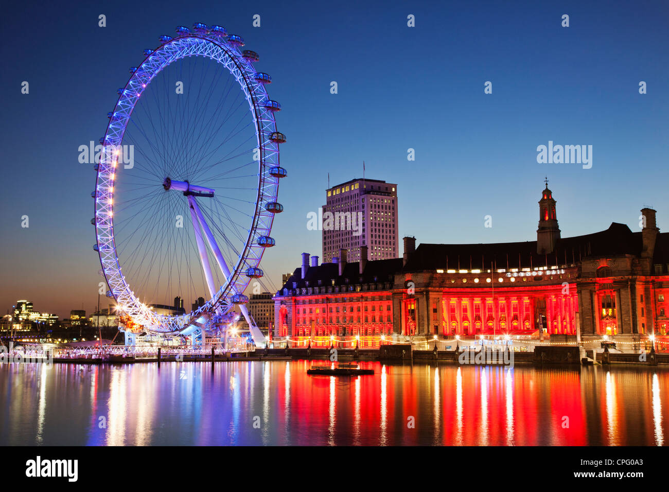 England, London, London Eye and County Hall Building Stock Photo