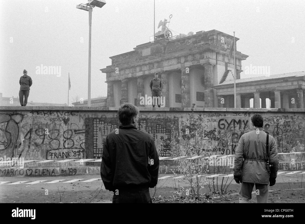 Border guards during the opening of the Berlin Wall at the Brandenburg
