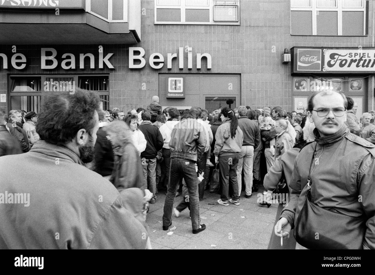 GDR citizens waiting for their welcome payment, Berlin, Germany Stock Photo