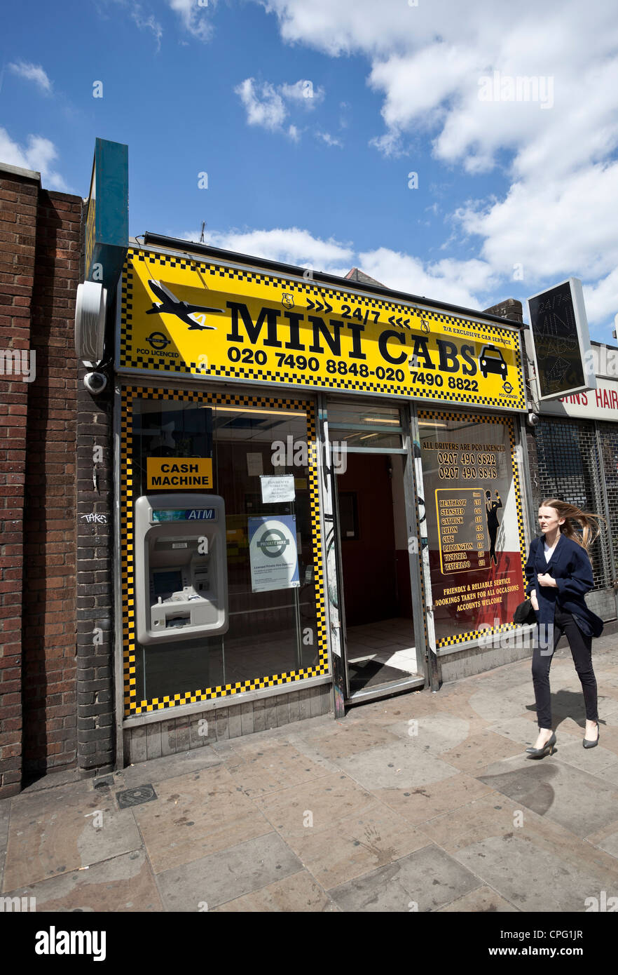 Mini cabs office, Shoreditch, London, England, UK Stock Photo