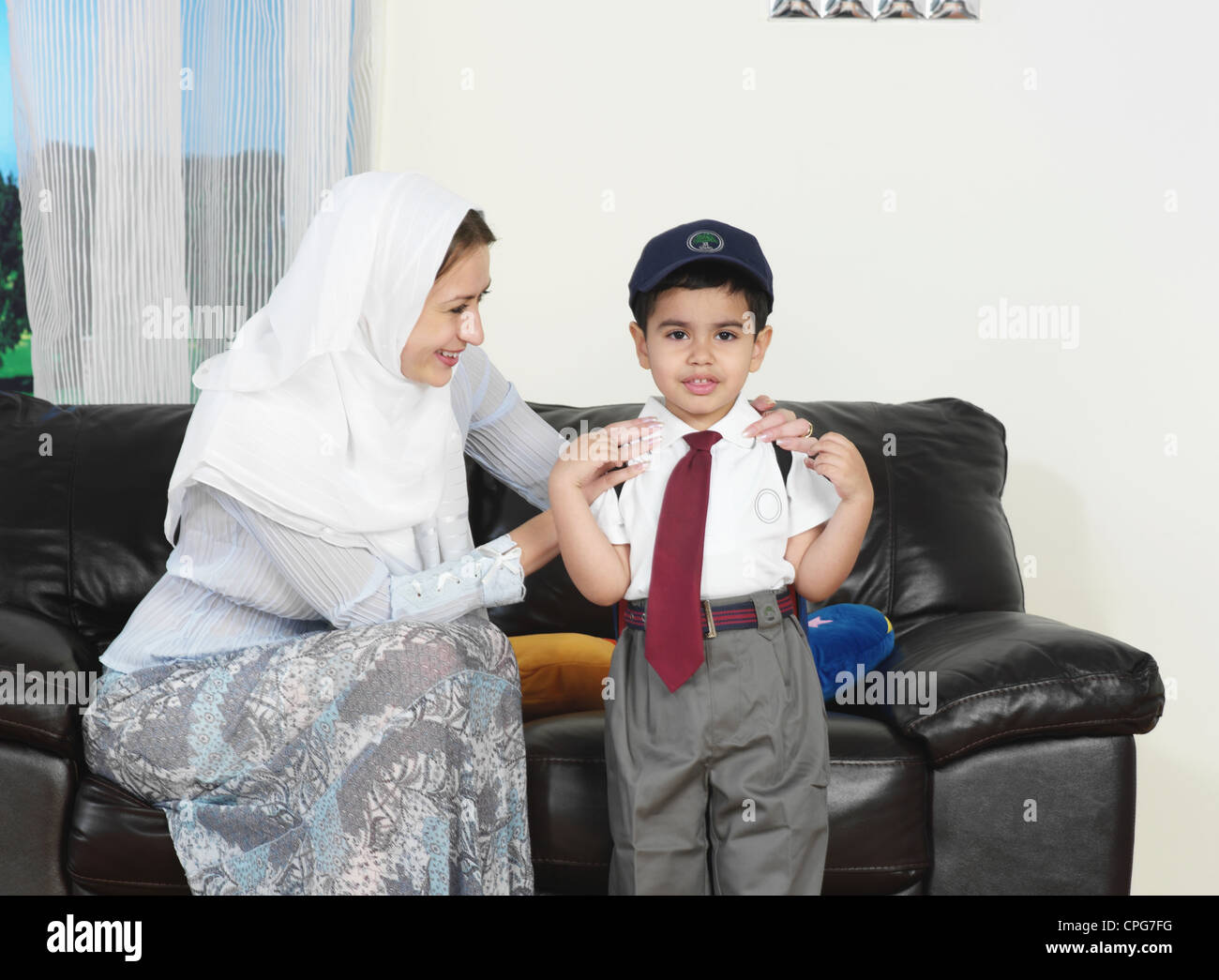 Child school uniform adult home hi-res stock photography and images - Alamy