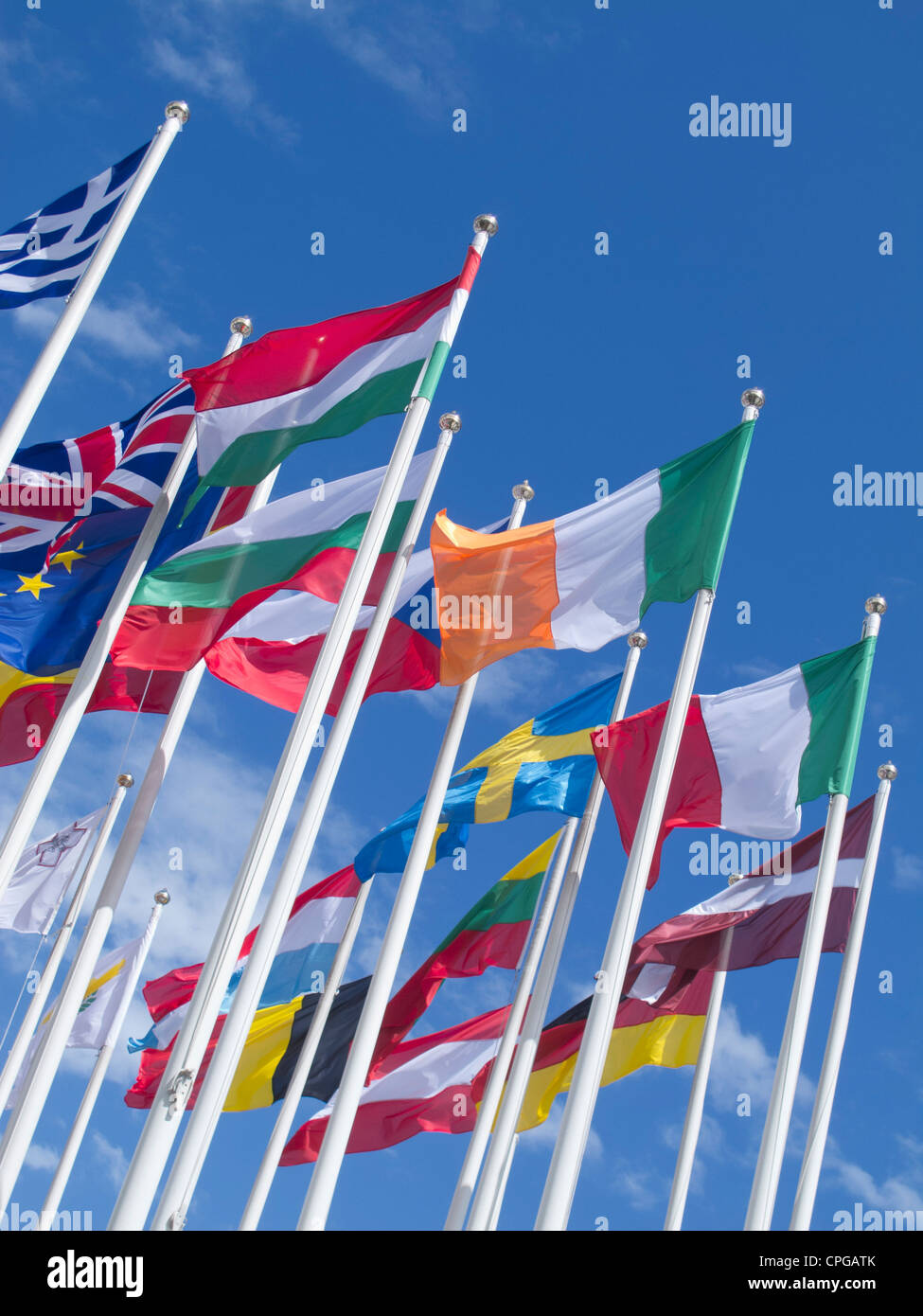 Flags of many nations flying Stock Photo