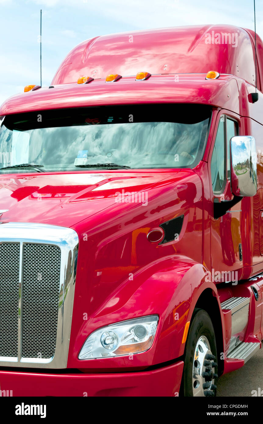 New red semi truck ready to go to work. Stock Photo