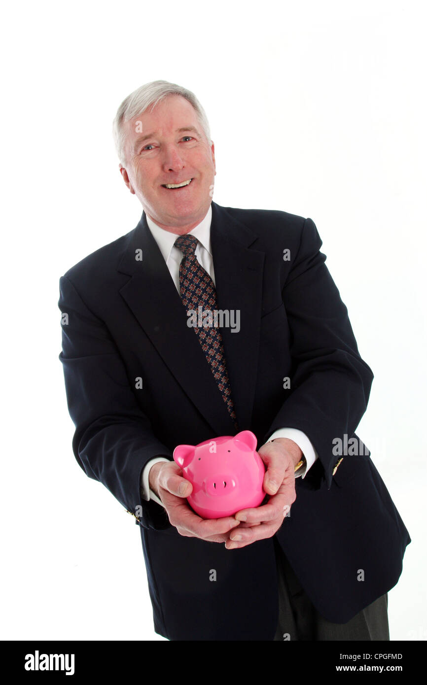 Senior man Holding A Pink Piggy Bank Stock Photo - Alamy