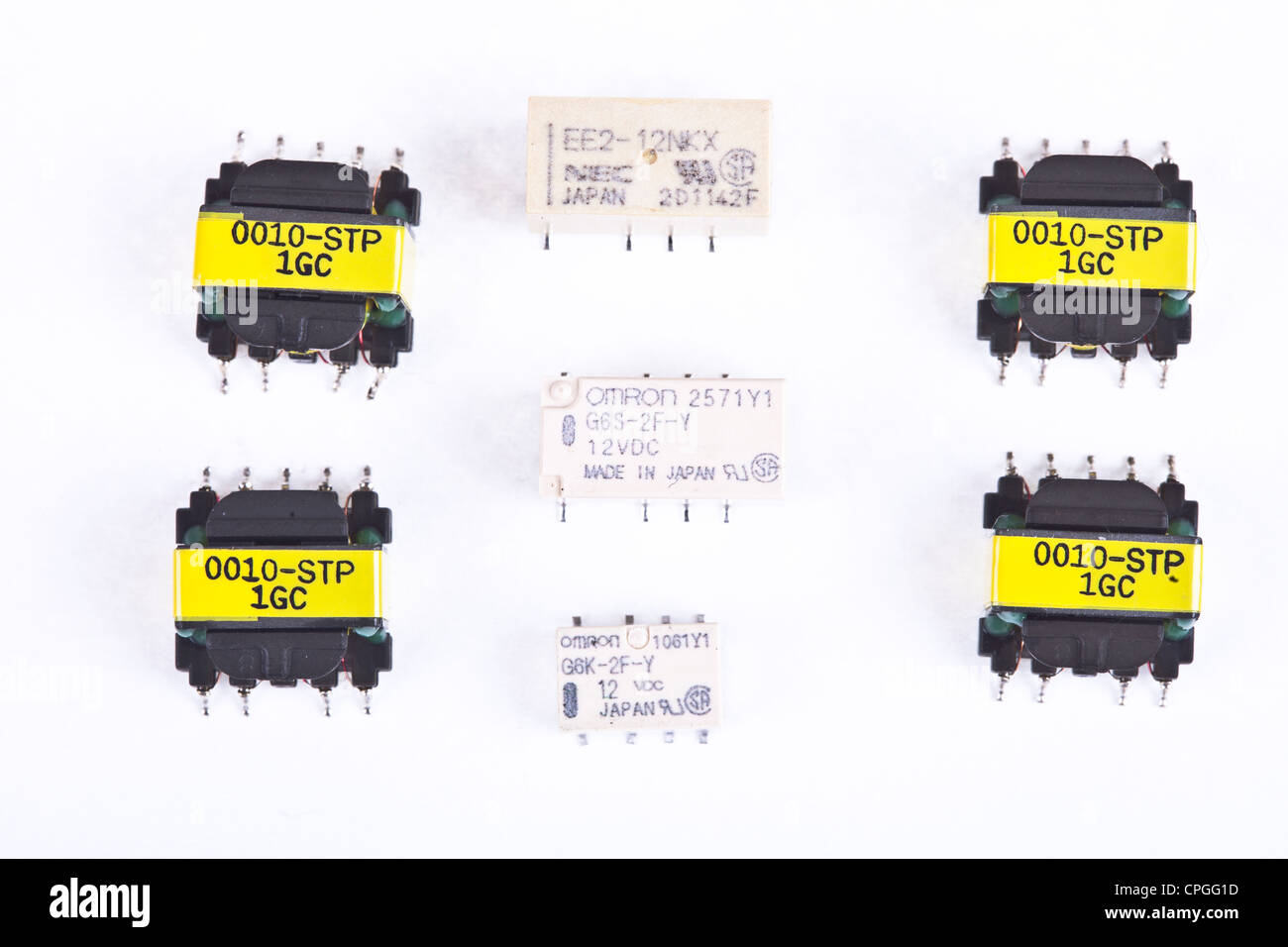 SMT / SMD relays and transformers used to assembly PCB's printed circuit in the electronics industry, electronics devises. Stock Photo
