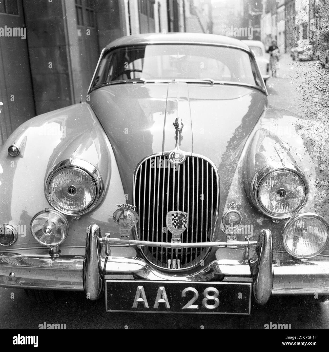 Historical, 1960s. Front view of sports car showing grill and head-lights with number plate AA 28. Stock Photo