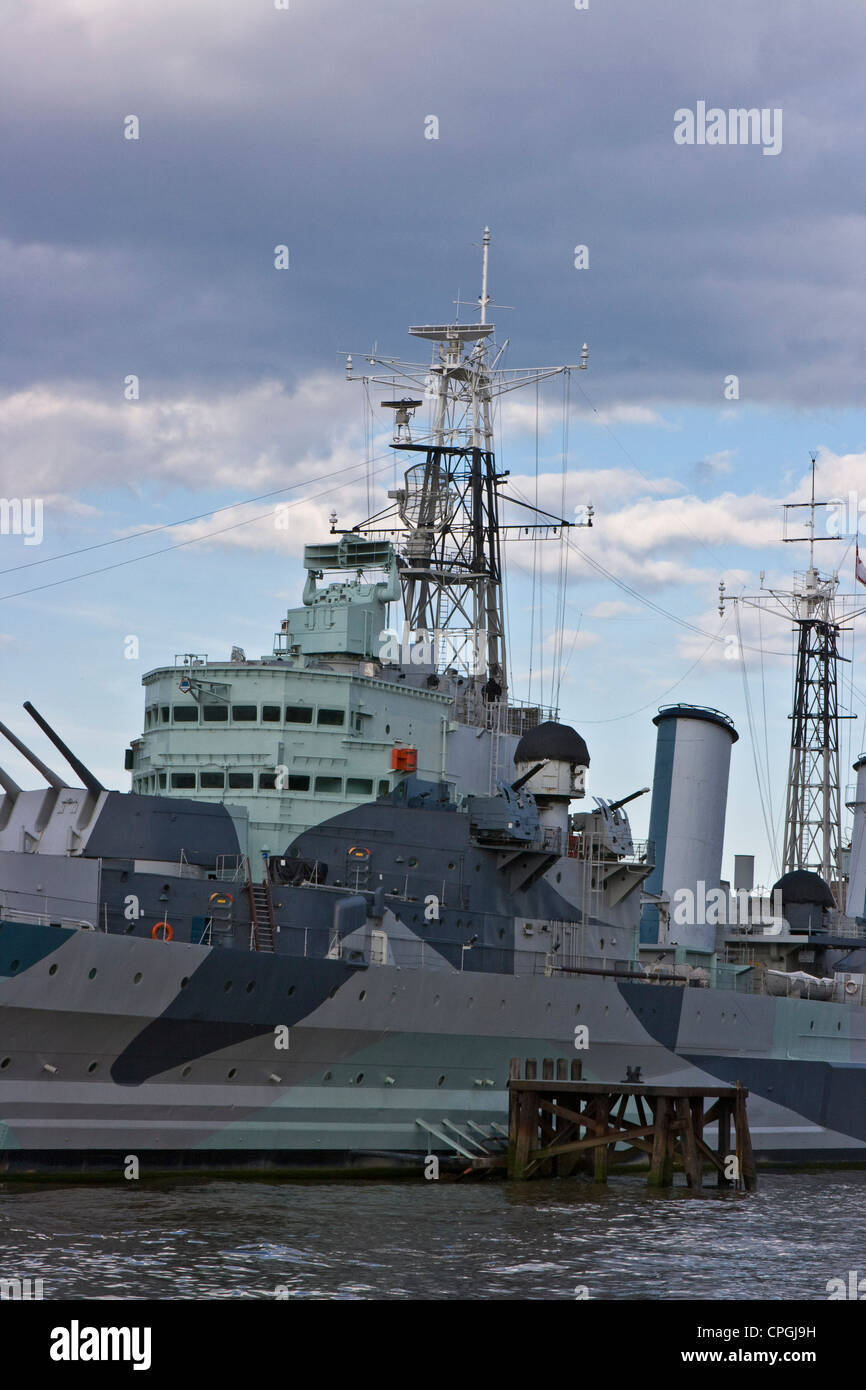HMS Belfast 1930's Royal Navy light cruiser now a museum ship moored on the river Thames London England Europe Stock Photo