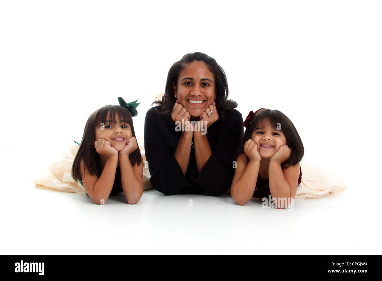 Young mixed race family on a white background Stock Photo
