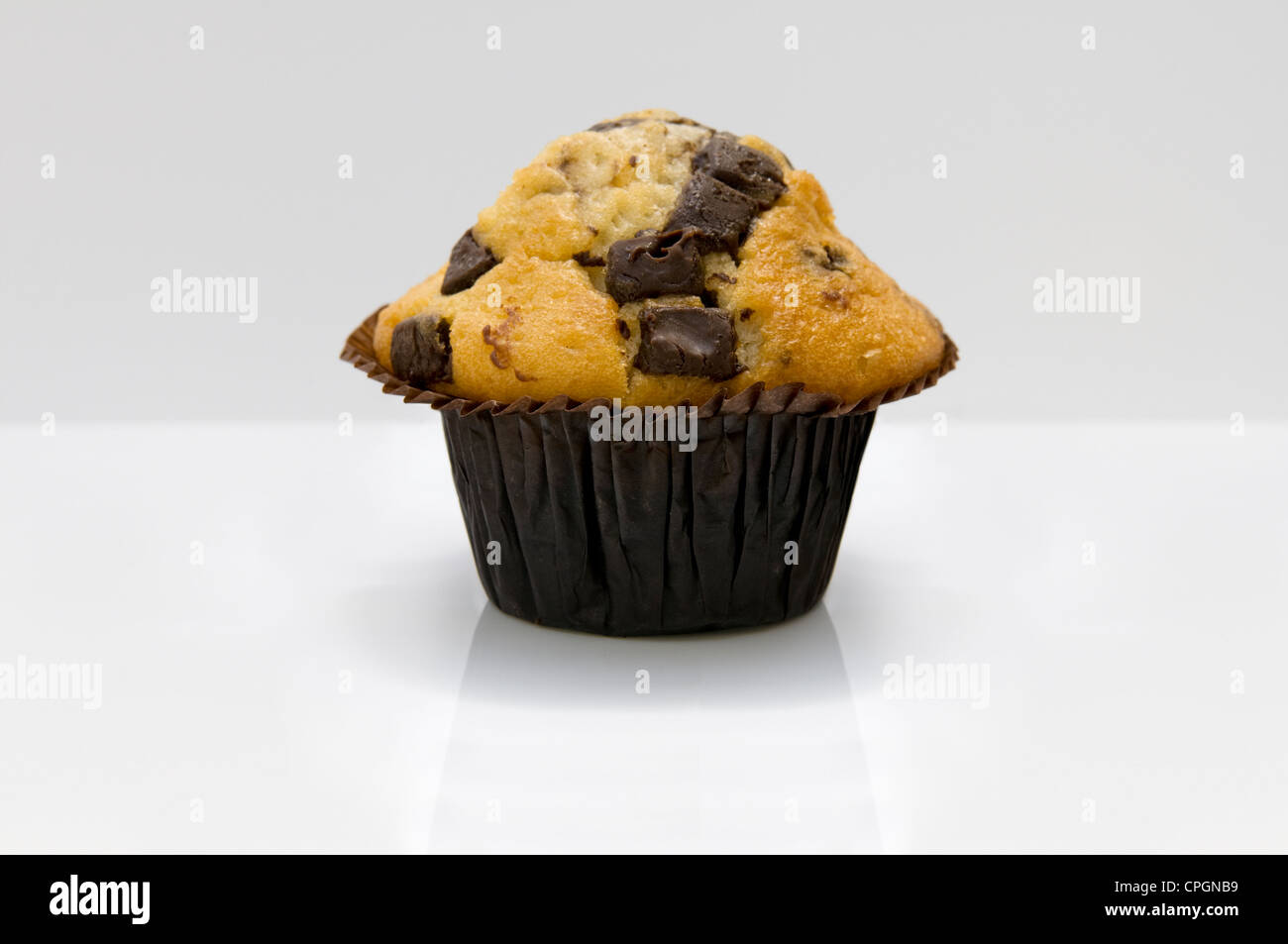 Chocolate chip muffin on white background Stock Photo