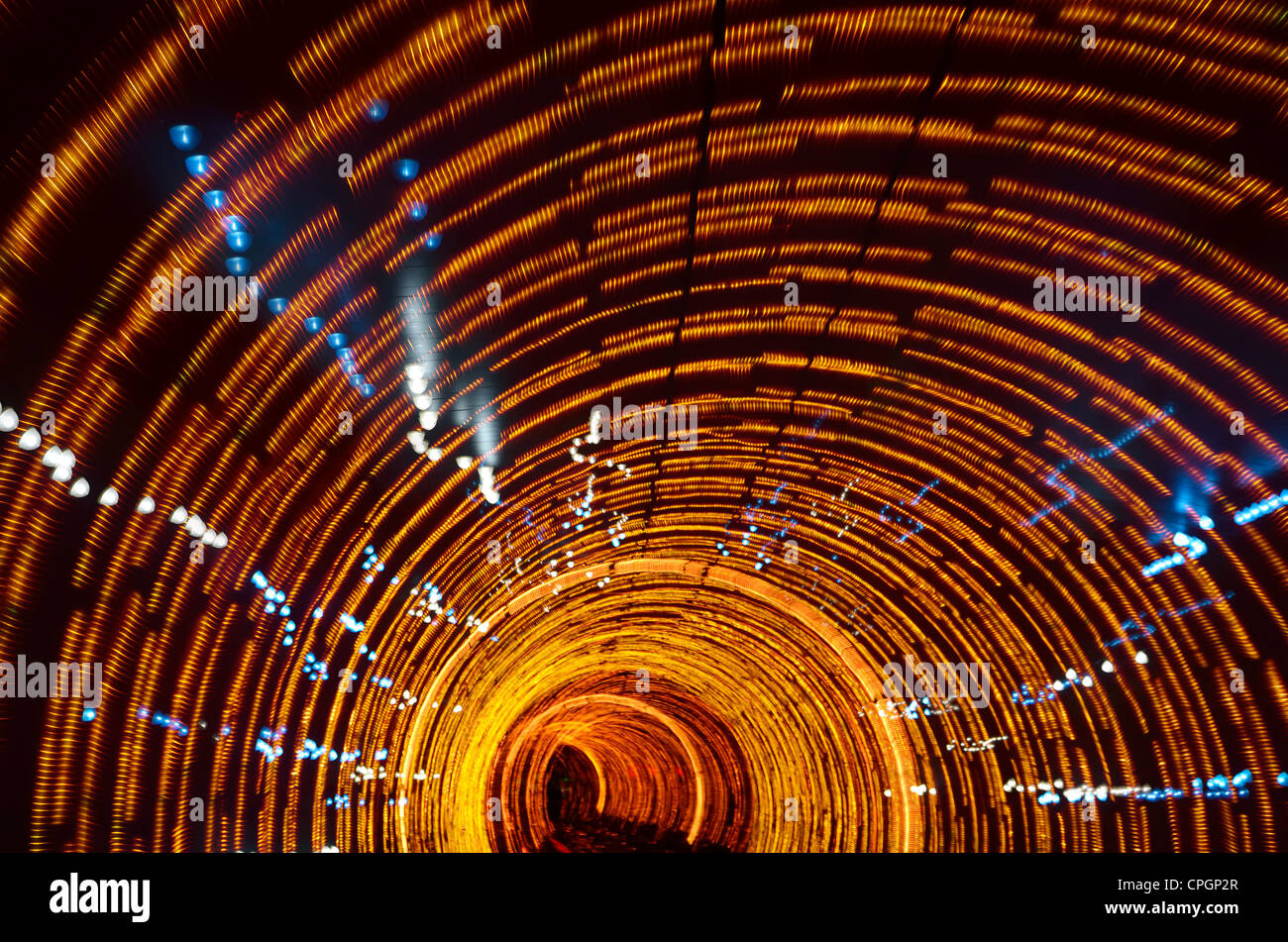 Psychedelic orange lights in the Bund Sightseeing Tunnel under the Huangpu River Shanghai China Stock Photo