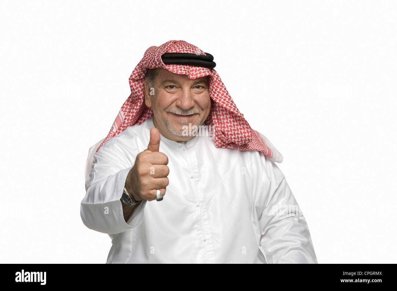 Mature man showing thumbs up, smiling, portrait Stock Photo