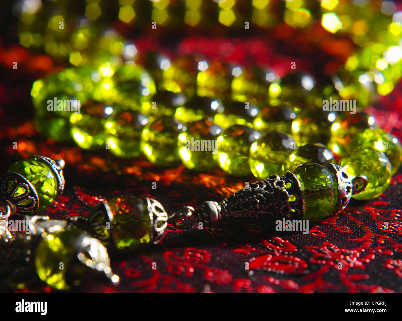 Prayer beads against white background Stock Photo