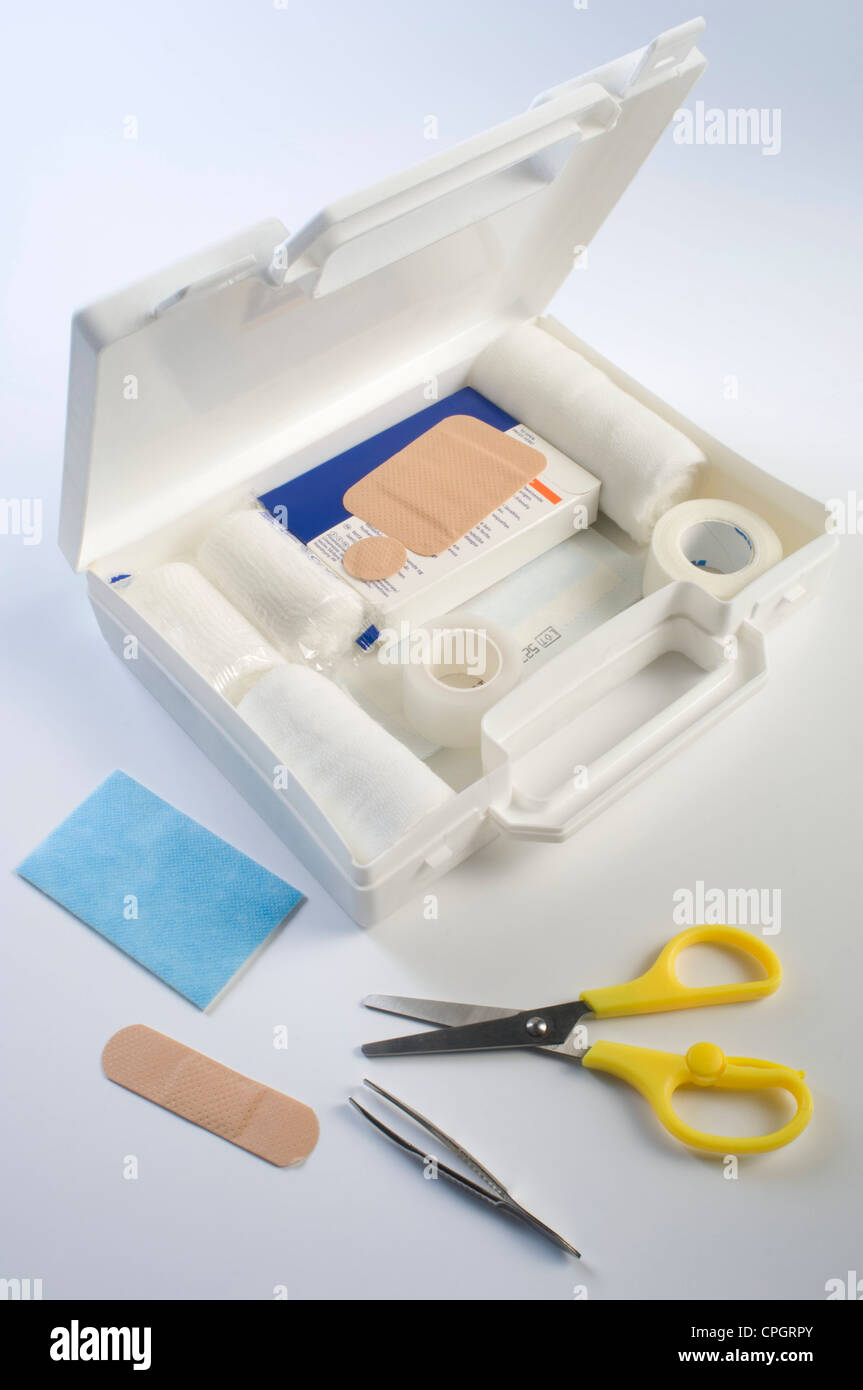 First aid consisting of tape, gauze, tweezers, scissors and bandage