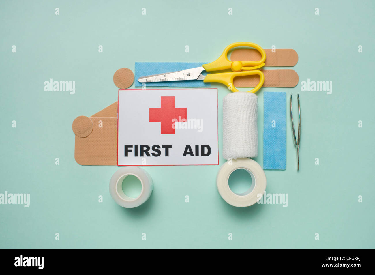 First aid consisting of tape, gauze, tweezers, scissors and bandage