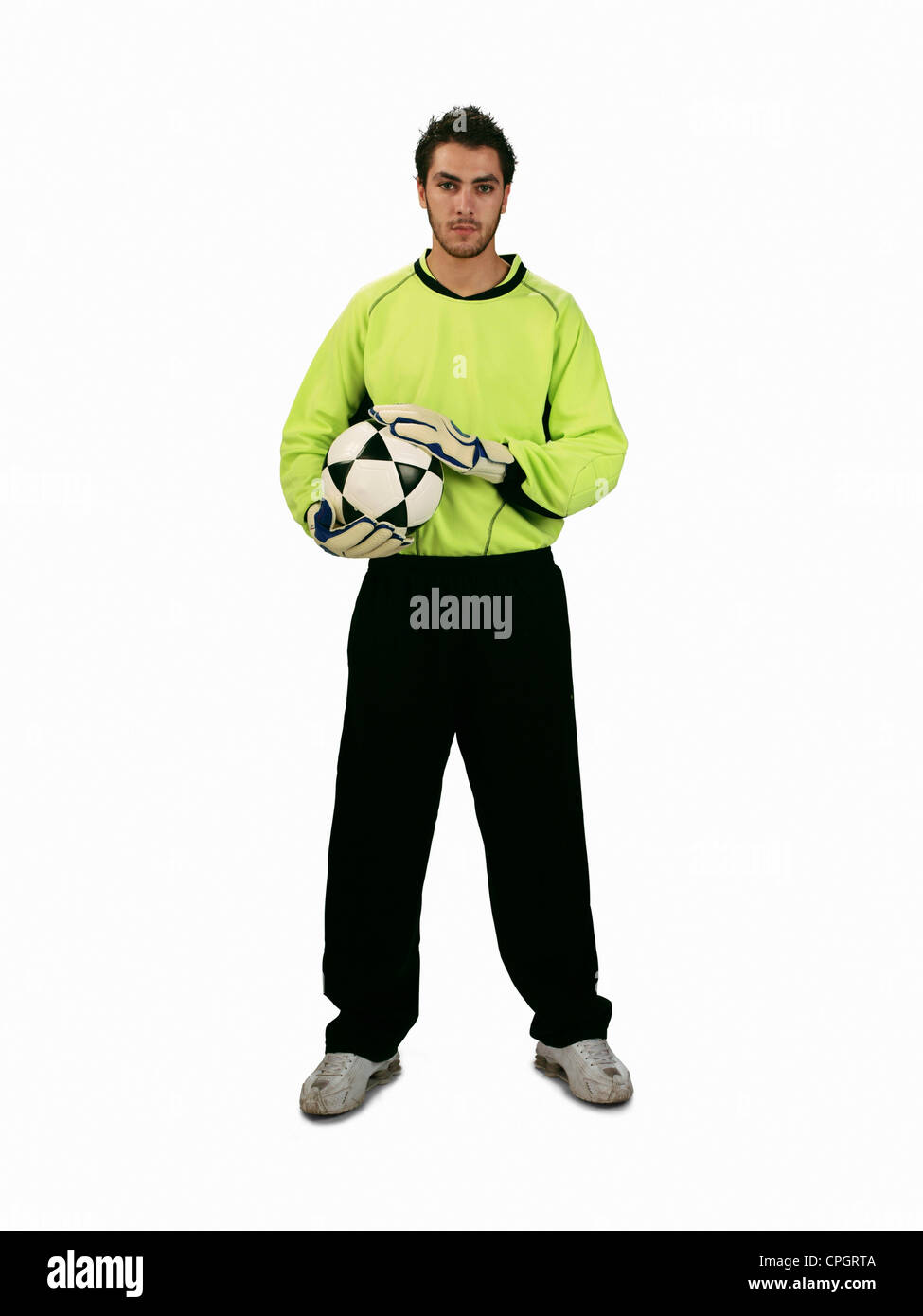 Goalie holding soccer ball, portrait Stock Photo Alamy