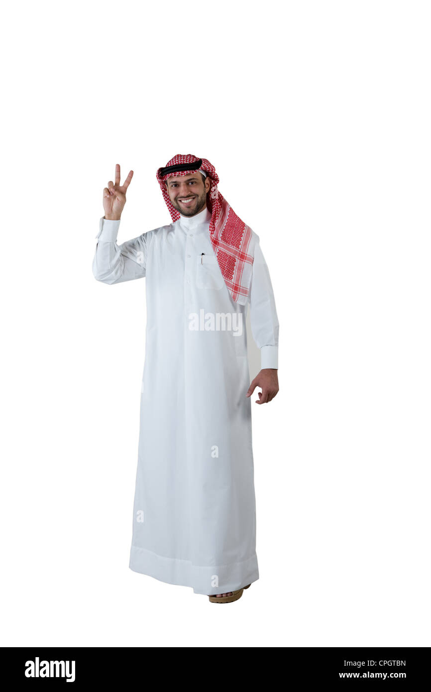 Arab man giving peace sign Stock Photo