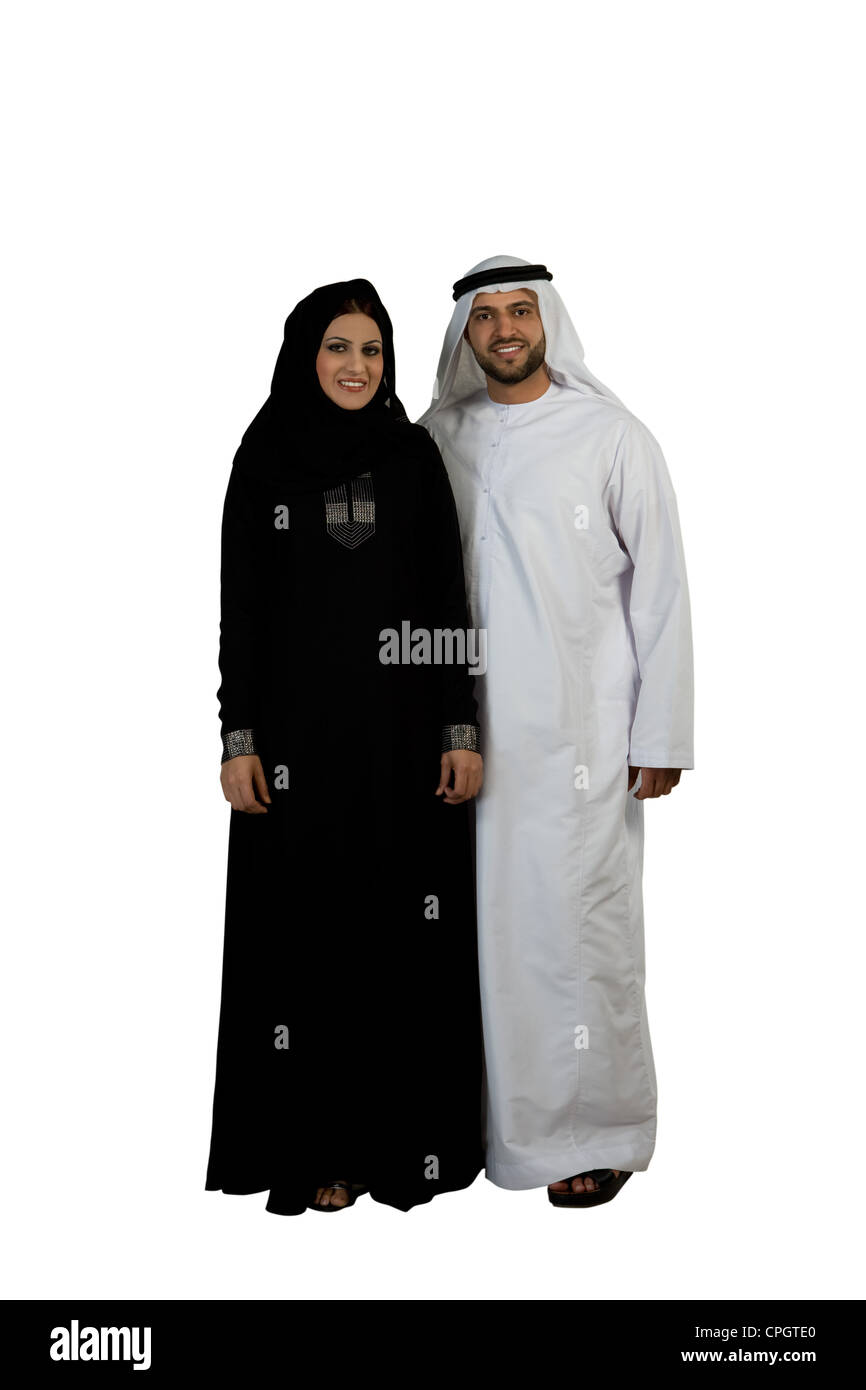 Arab couple wearing traditional dress, smiling Stock Photo