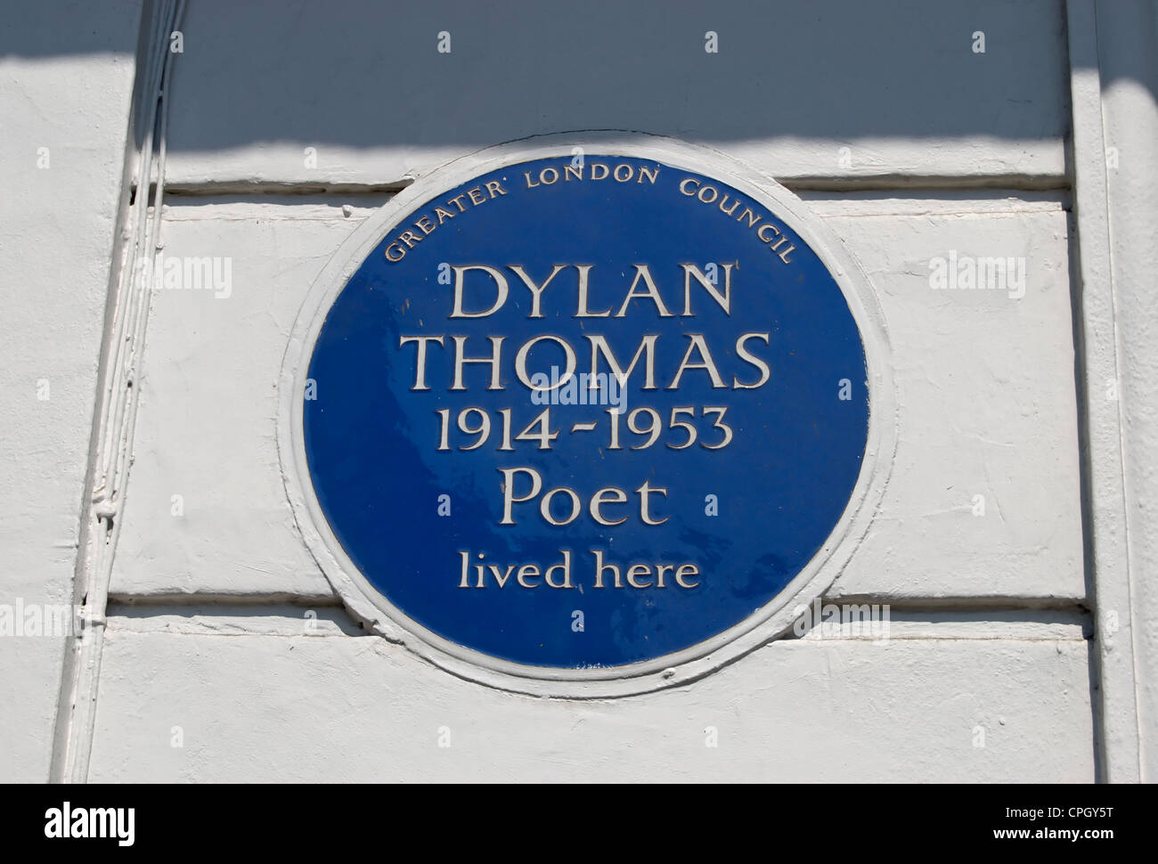 greater london council blue plaque marking a home of poet dylan thomas, camden, london, england Stock Photo