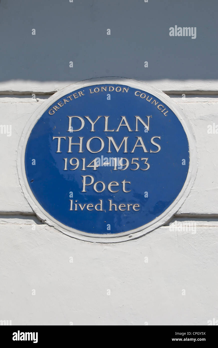 greater london council blue plaque marking a home of poet dylan thomas, camden, london, england Stock Photo