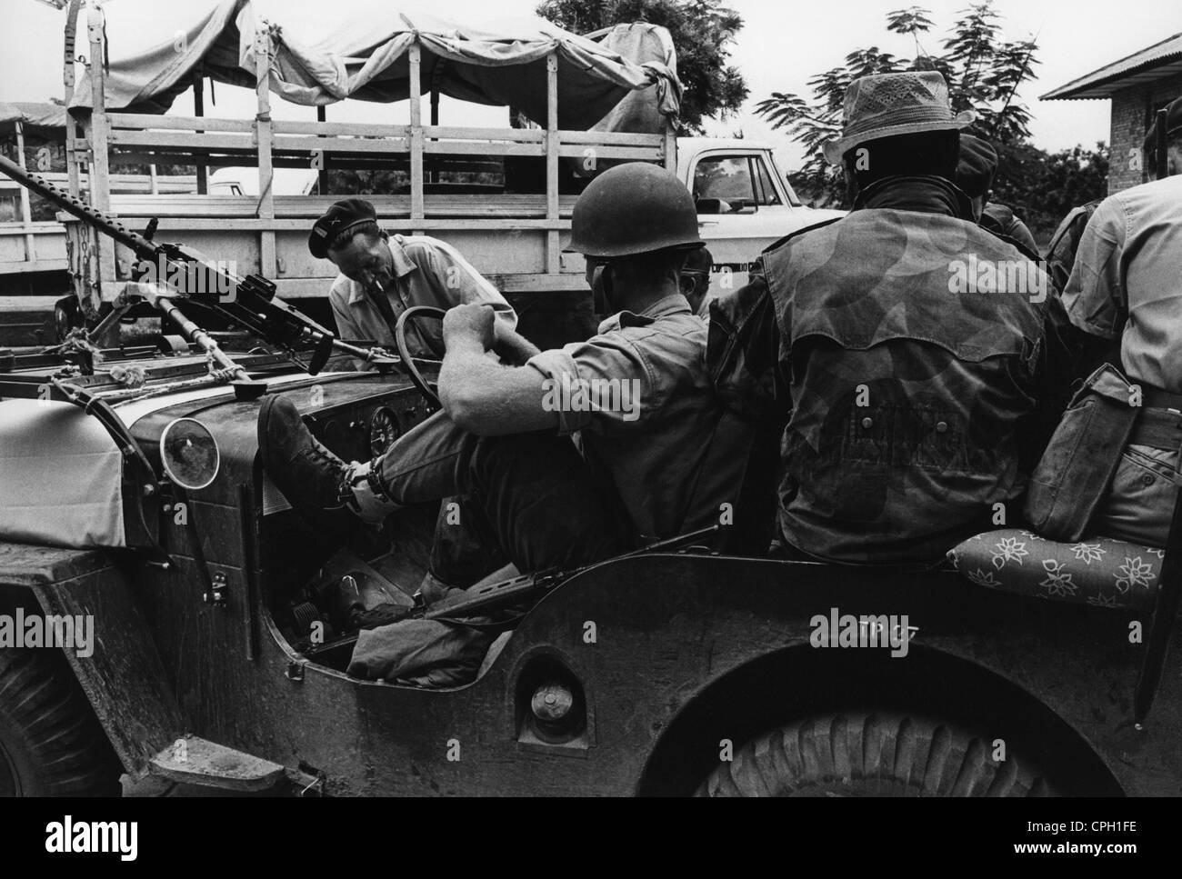 geography/travel, Congo, events, Simba uprising 1964 - 1965, mercenaries in a Jeep, Lisala, Equateur province, 6.10.1964, Democratic Republic of the Congo, Congo Crisis, Civil War, military, arms, Africa, 20th century, historic, historical, Willy's Jeep, 1960s, people, Additional-Rights-Clearences-Not Available Stock Photo