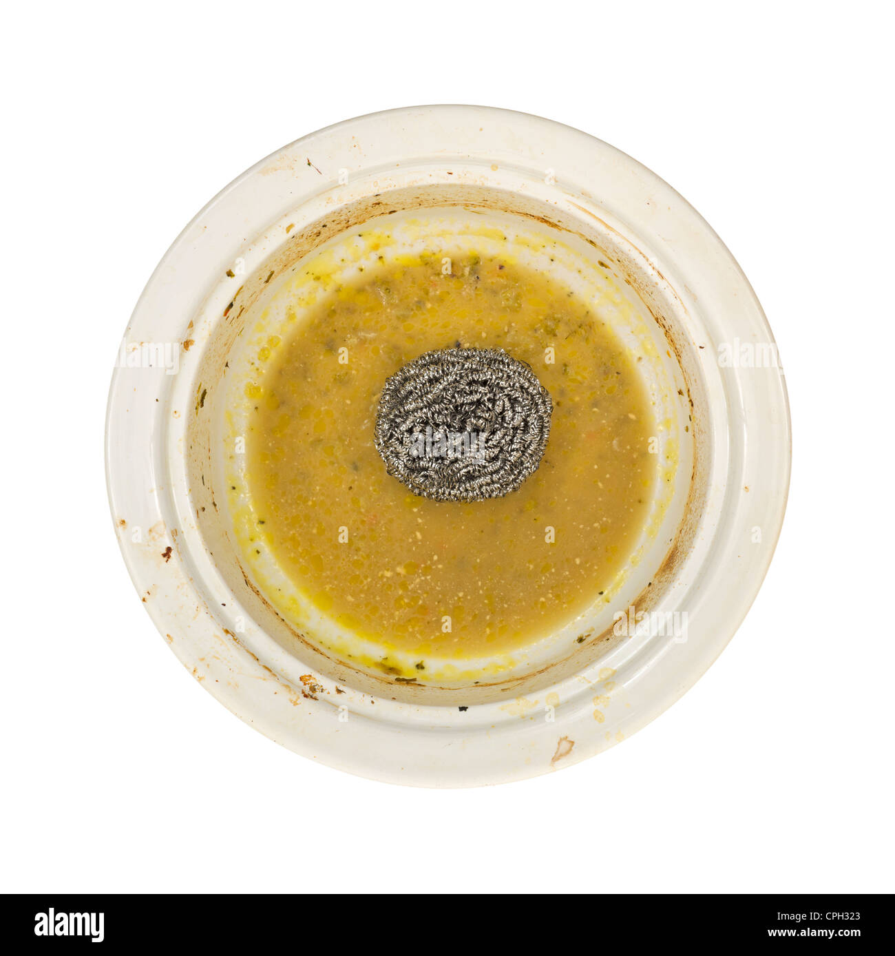 Scouring pad in greasy baking dish Stock Photo Alamy