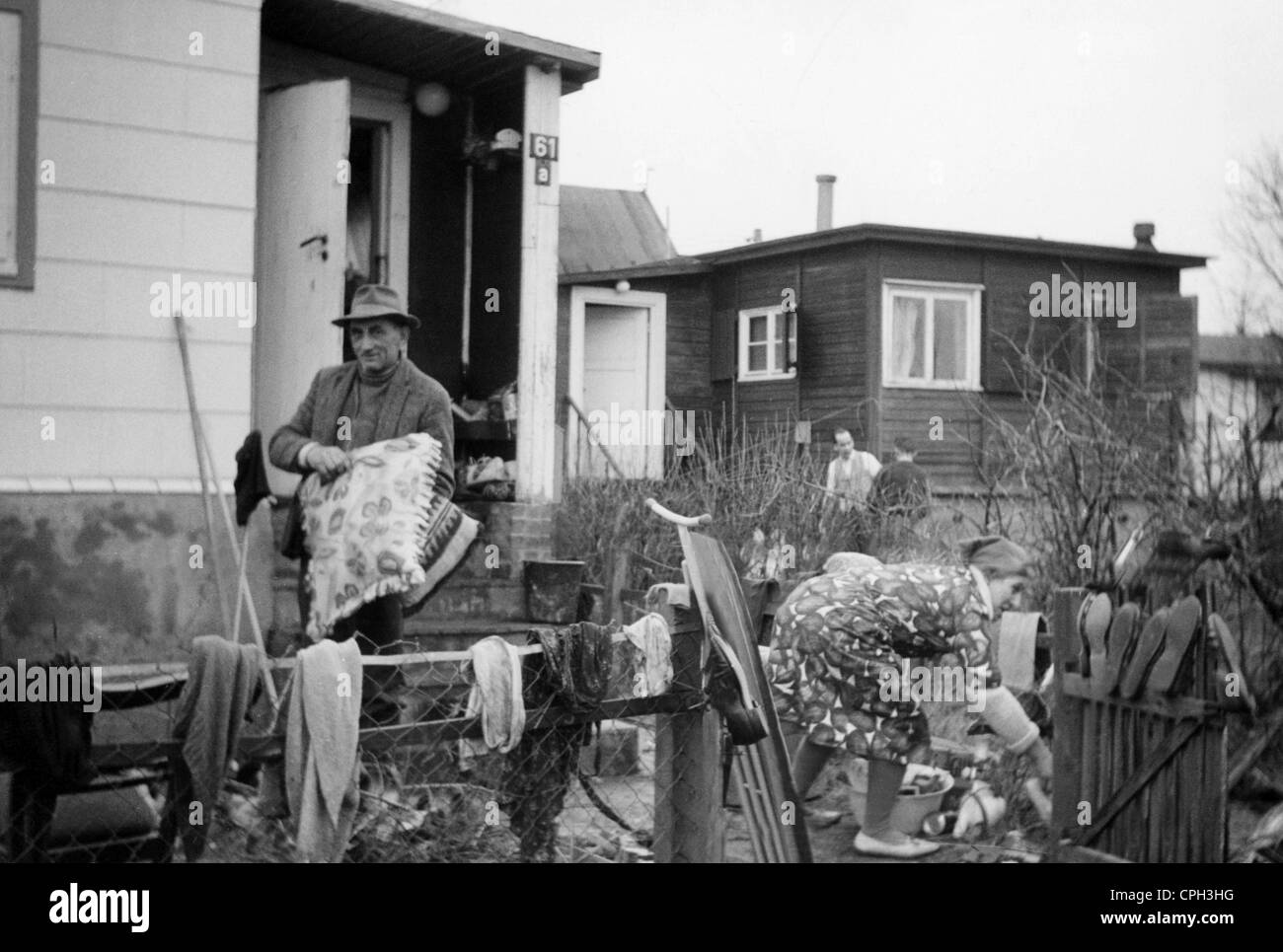 disasters, floods, North Sea flood, 16./17.2.1962, West Germany, Hamburg, couple in front of its house at Overhaken, Kirchenwerder, 18.2.1962, victims, people, natural disaster, catastrophe, destruction, historic, historical, 20th century, 1960s, 60s, Additional-Rights-Clearences-Not Available Stock Photo