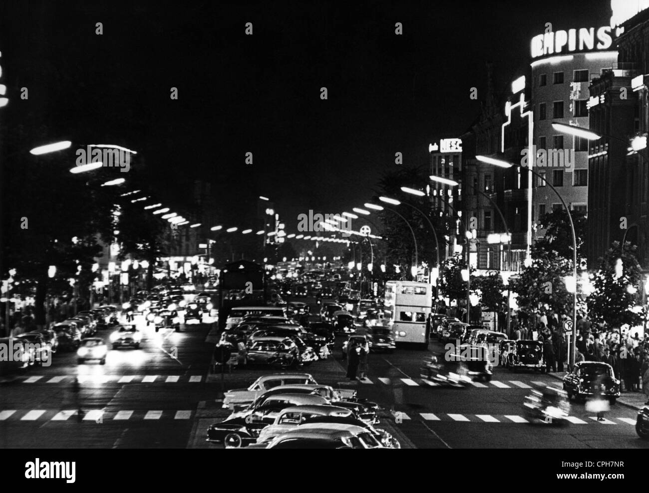 geography / travel, Germany, Berlin, streets, Kurfürstendamm, night shot, 1960s, 20th century, street scene, street scenes, pedestrian, pedestrians, passer-by, passerby, passers-by, Kudamm, transport, transportation, car, cars, bus, buses, busses, luminous advertising, neon sign, neon signs, nights, at night, by night, street lamp, street lamps, Central Europe, Europe, traffic engineering, mobility, 60s, historic, historical, Kurfuerstendamm, Kurfürstendamm, Kurfurstendamm, 1950s, people, Additional-Rights-Clearences-Not Available Stock Photo
